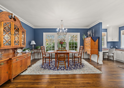 Dining room with Federalist style furniture and large bay window